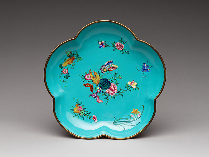 Lobed dish with flowers, fruits, and insects