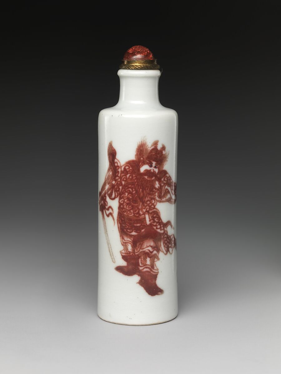 Snuff bottle with demon queller Zhong Kui, Porcelain painted in underglaze copper red and cobalt blue, coral stopper, China 