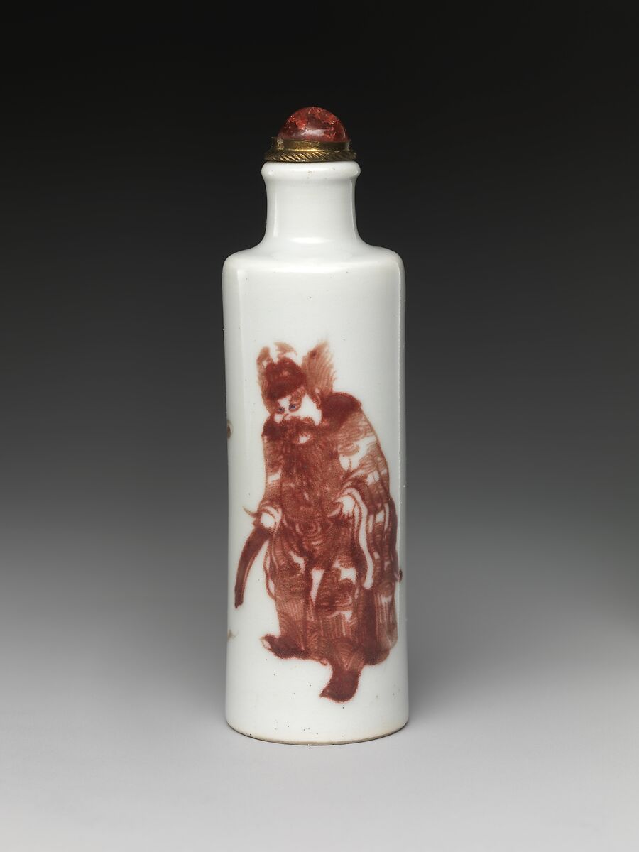Snuff bottle with demon queller Zhong Kui, Porcelain painted in underglaze copper red and cobalt blue, coral stopper, China