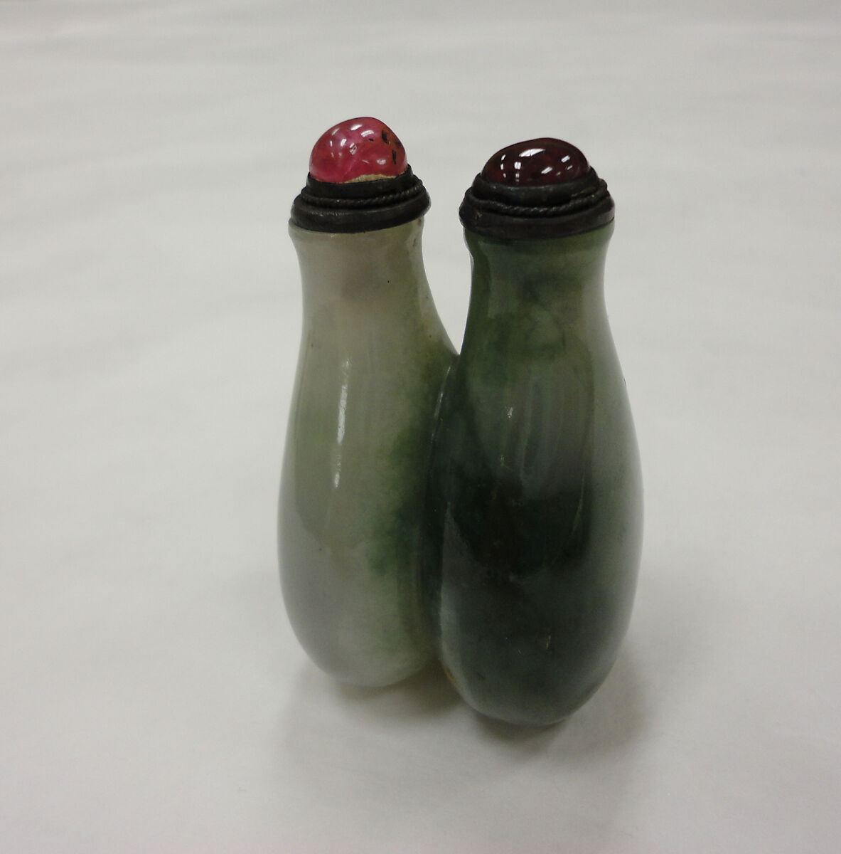 Twin Snuff Bottles, Green jadeite with rose quartz and red garnet stoppers, China 