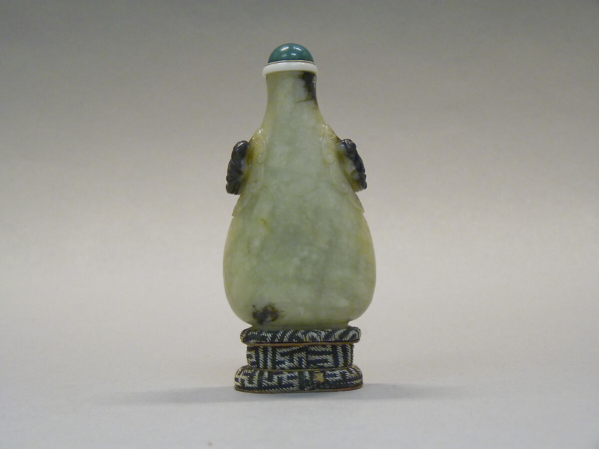 Snuff Bottle, Gray nephrite with black lion mask handles, blue and white stopper, silk stand, China 