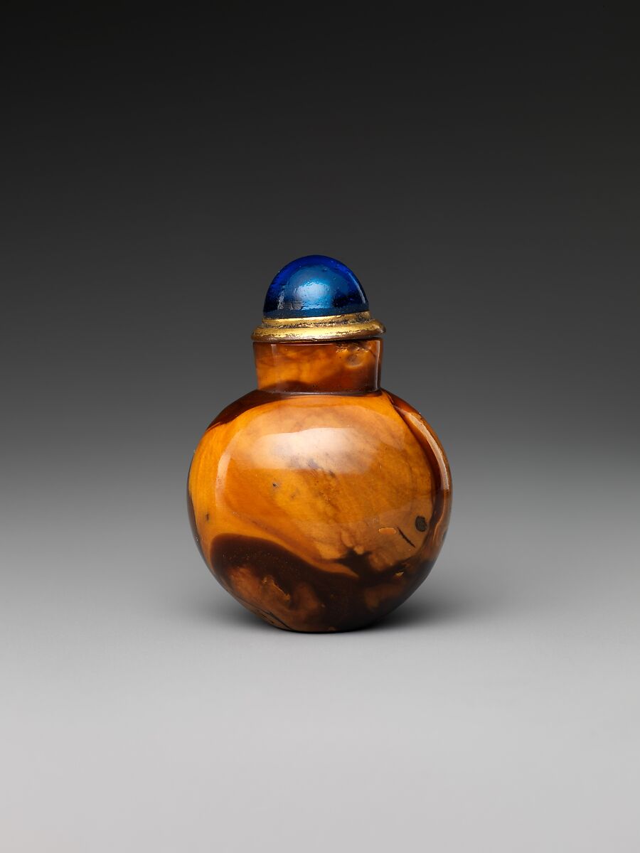 Snuff bottle, Amber with blue glass stopper, China 