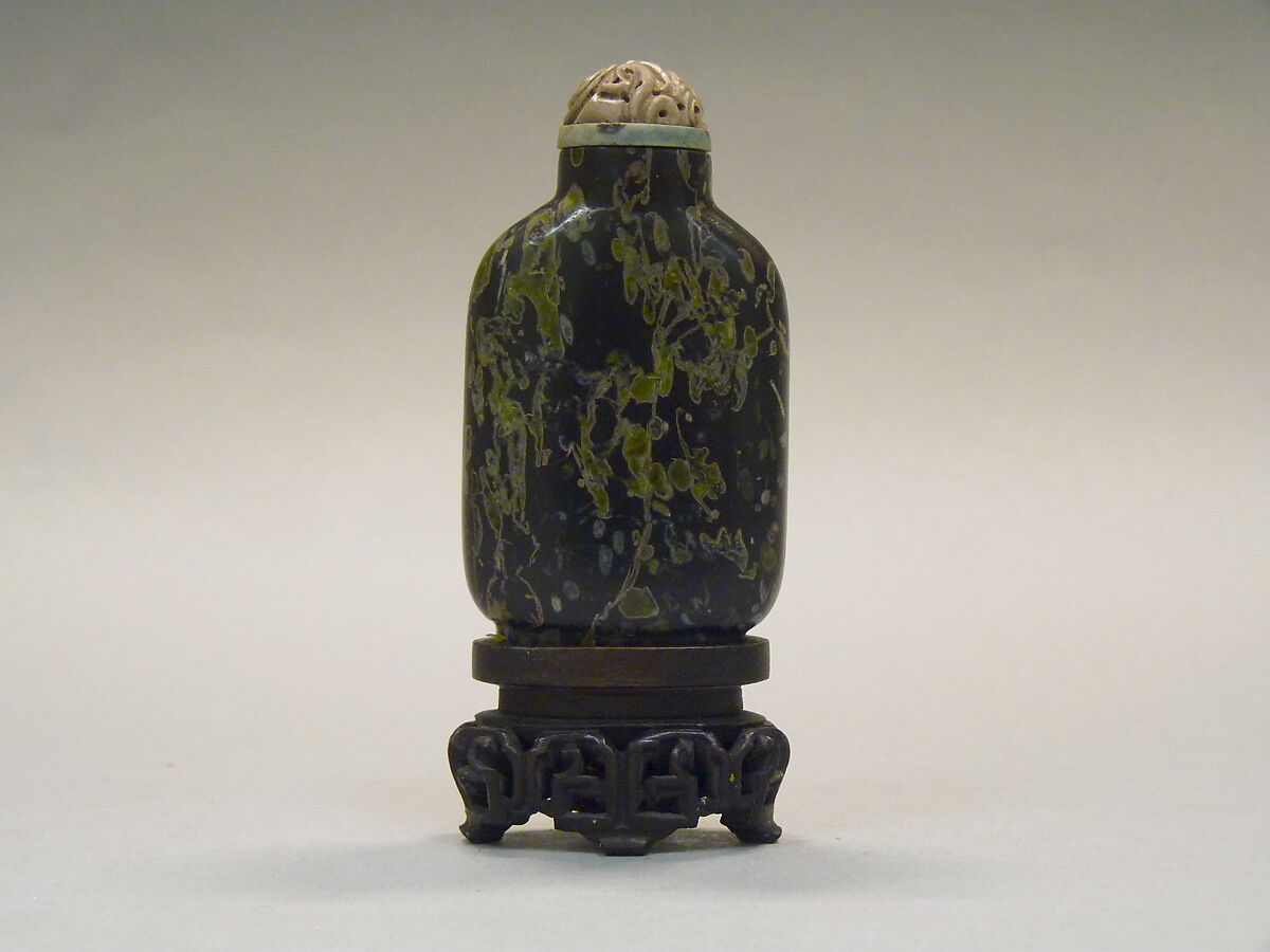 Snuff Bottle, Volcanic stone with coral stopper, China 