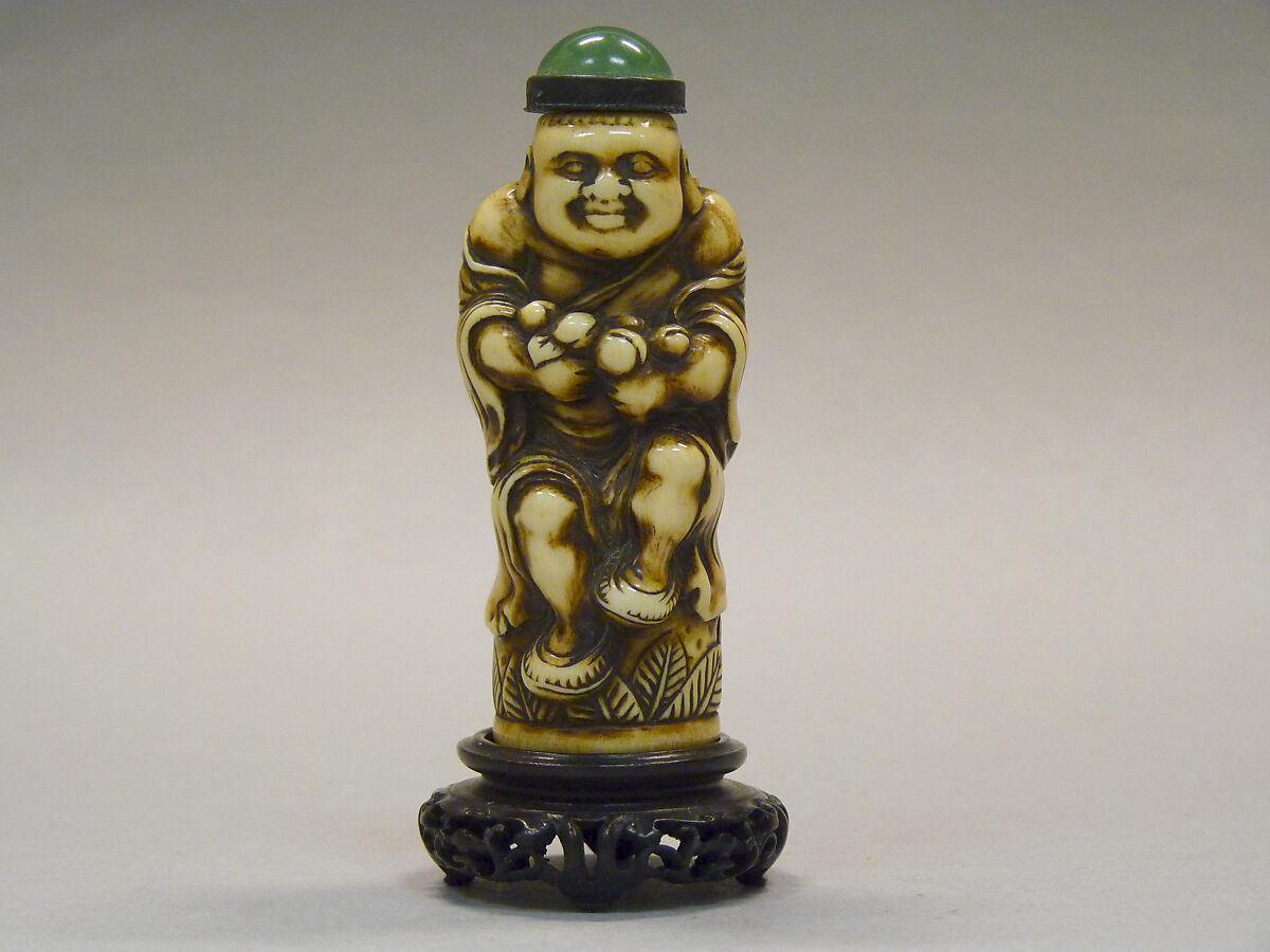 Snuff Bottle, Carved ivory with green glass stopper, China 