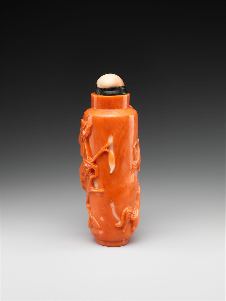 Snuff bottle with boy flying a bird, Coral, China