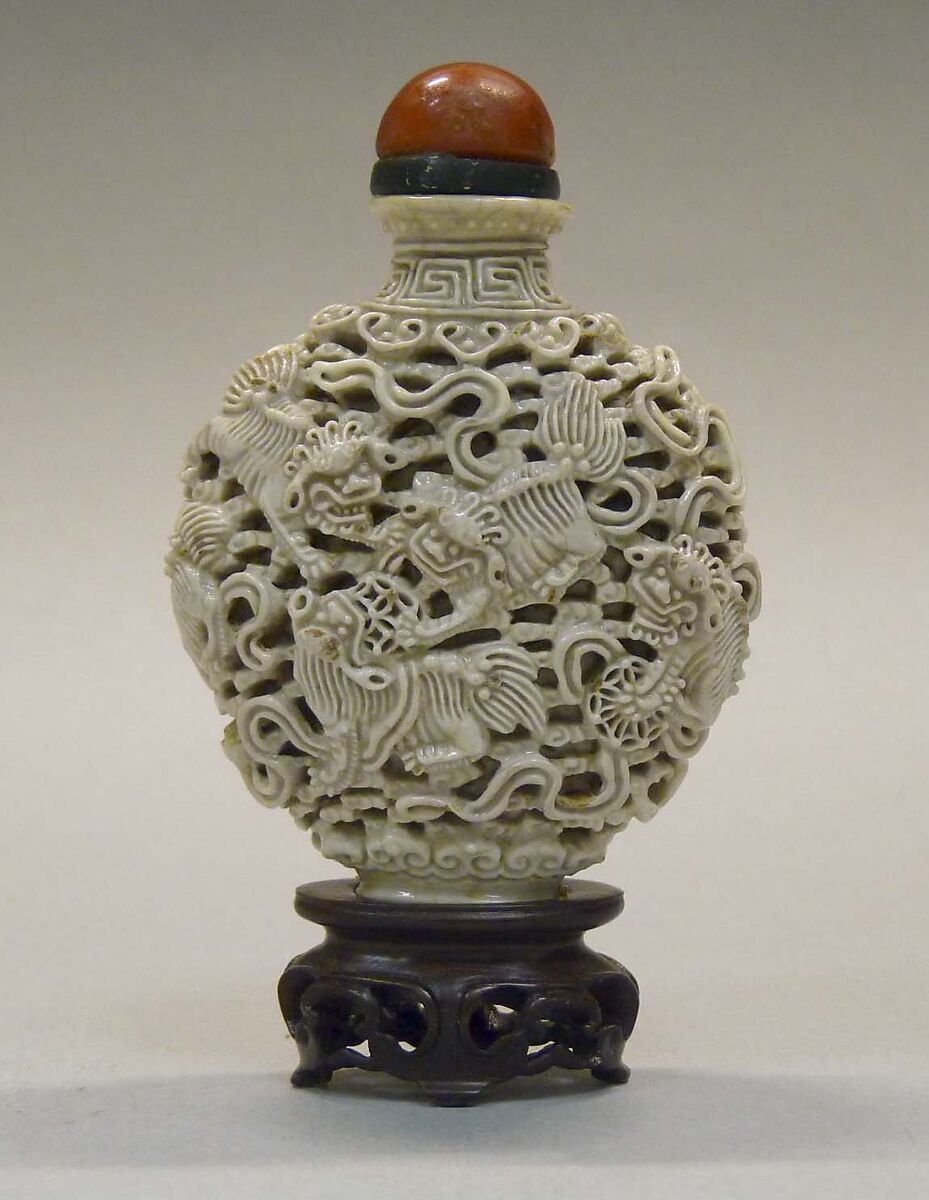 Snuff Bottle, White porcelain in openwork design, red glass stopper, China 
