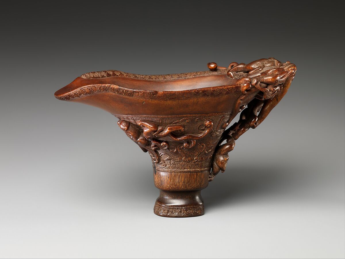 Cup in the shape of an archaic vessel with feline dragons, Rhinoceros horn, China