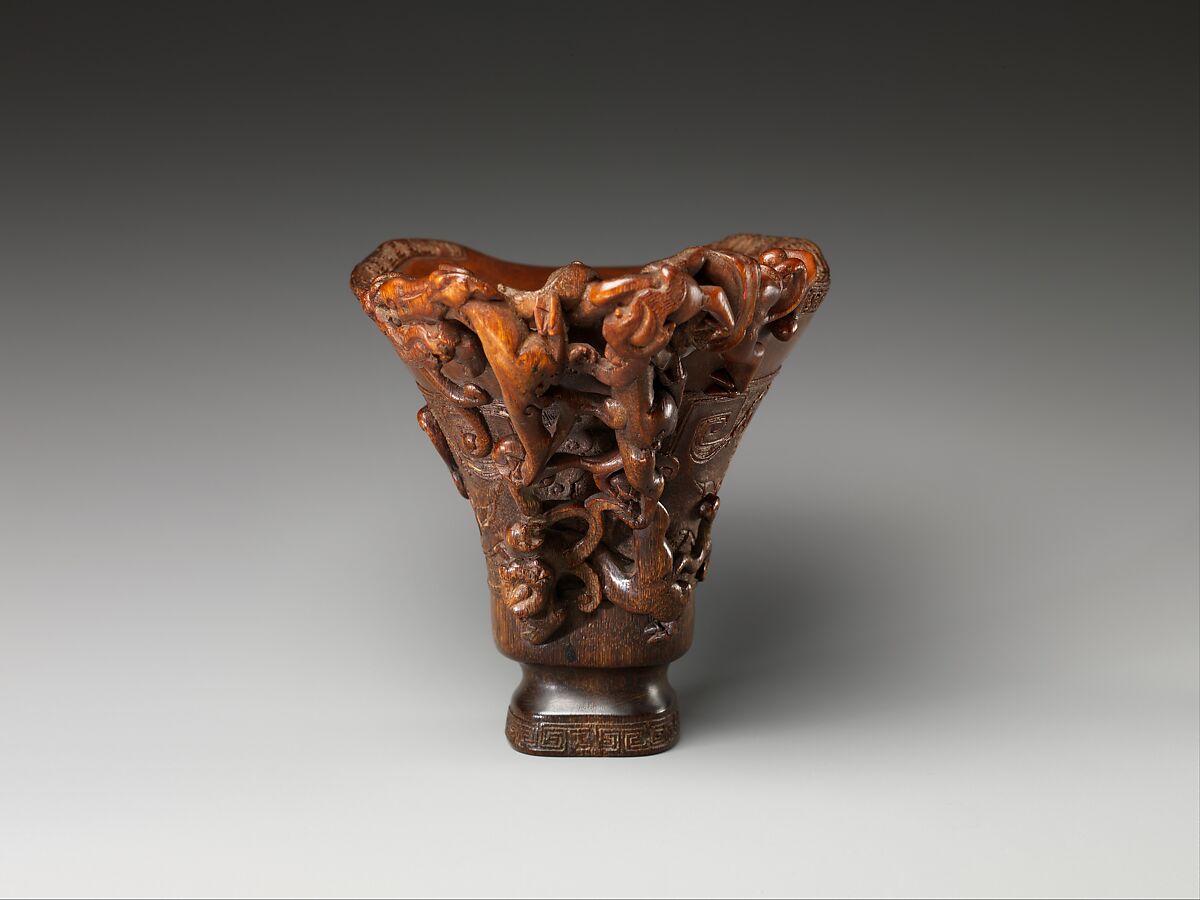 Cup in the shape of an archaic vessel with feline dragons, Rhinoceros horn, China