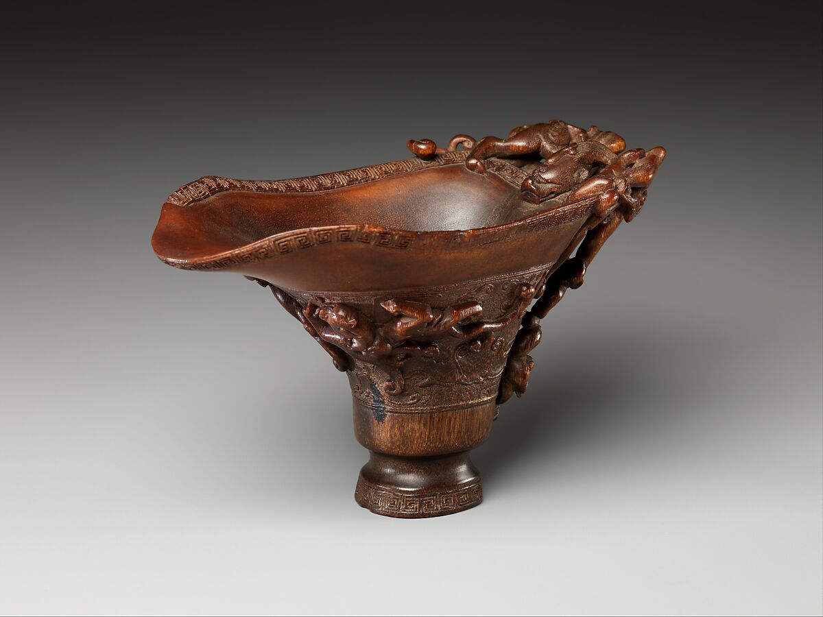 Cup in the shape of an archaic vessel with feline dragons, Rhinoceros horn, China
