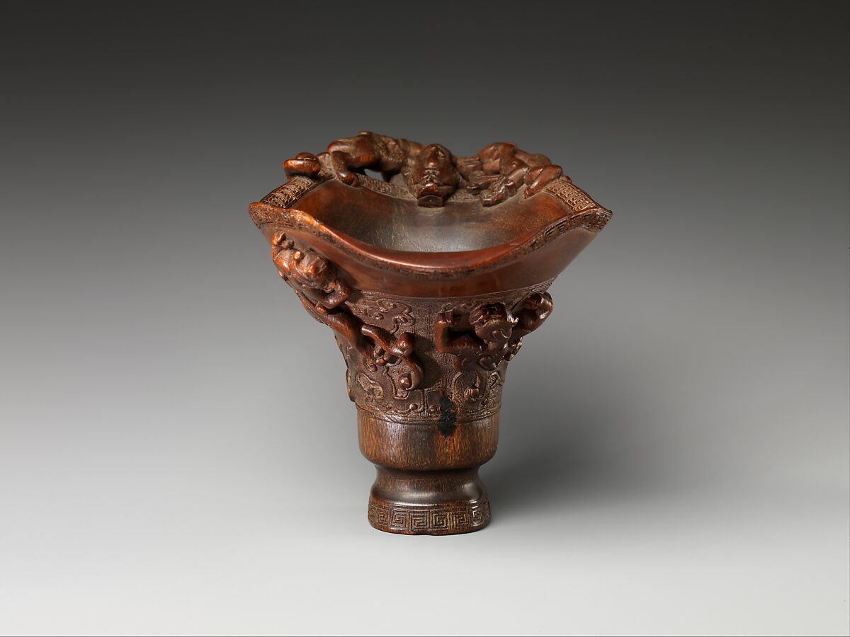 Cup in the shape of an archaic vessel with feline dragons, Rhinoceros horn, China