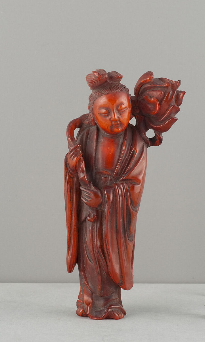 Standing Figure of Daoist Immortal (He Siengu), Amber, China 