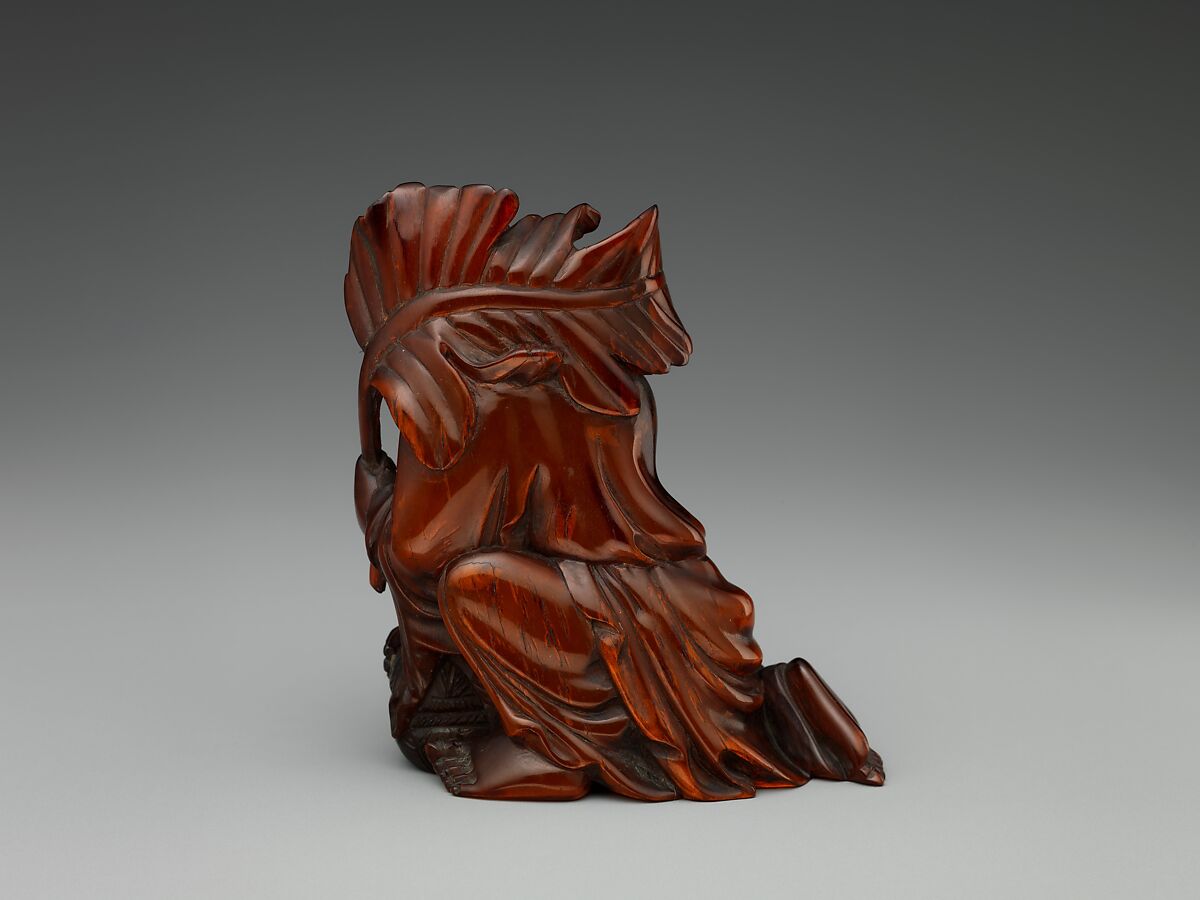 Boy with leaves and box, Horn, China