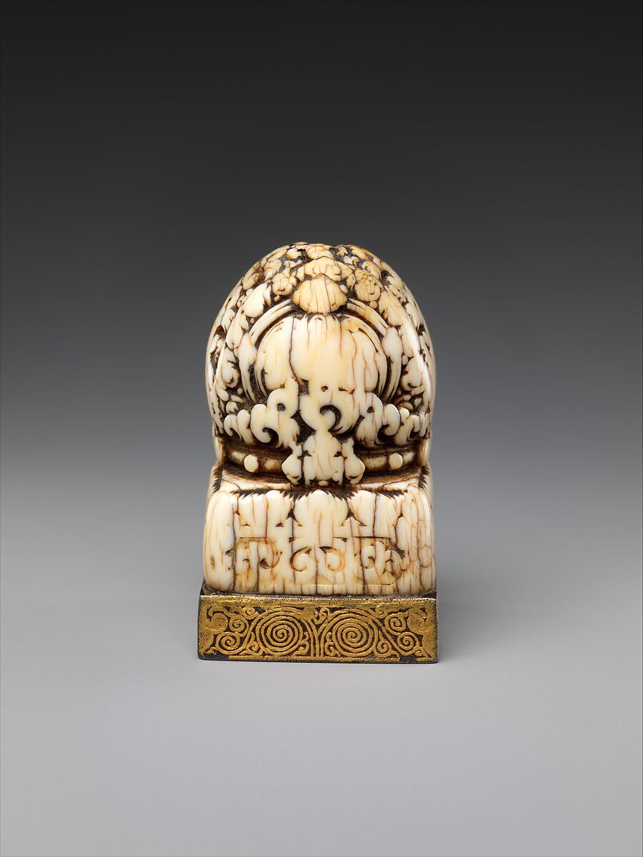 Seal with mantra in Vartu script, Ivory, turquoise, and iron damascened with gold, China