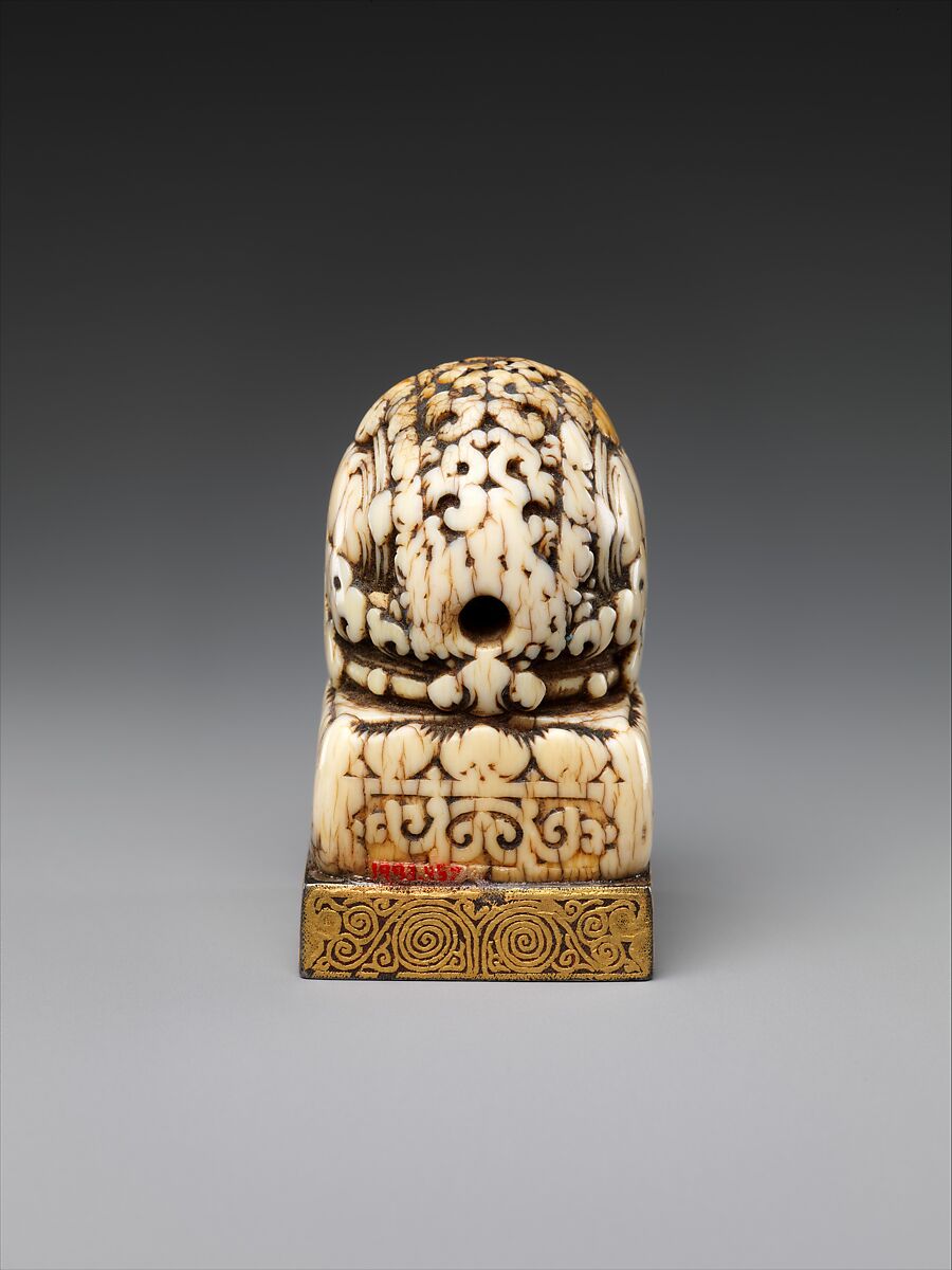 Seal with mantra in Vartu script, Ivory, turquoise, and iron damascened with gold, China