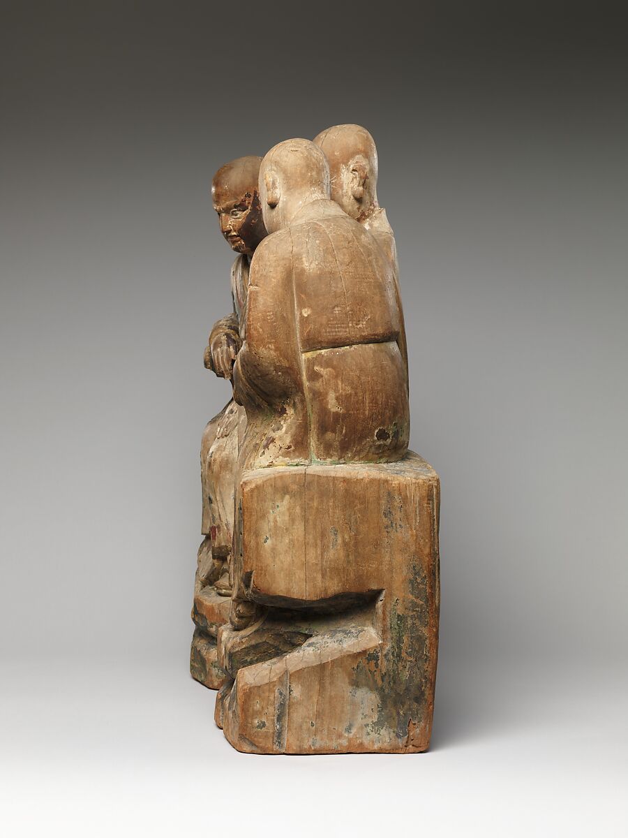 Three seated luohans, Willow wood with traces of pigment and gilding, China