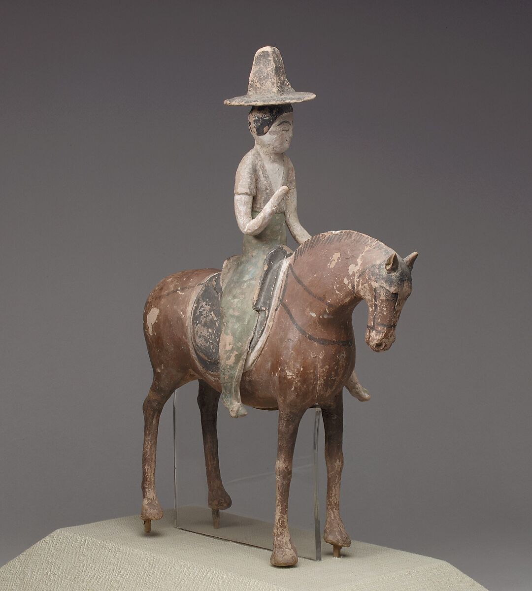Horse and female rider, Unfired clay with pigment, China