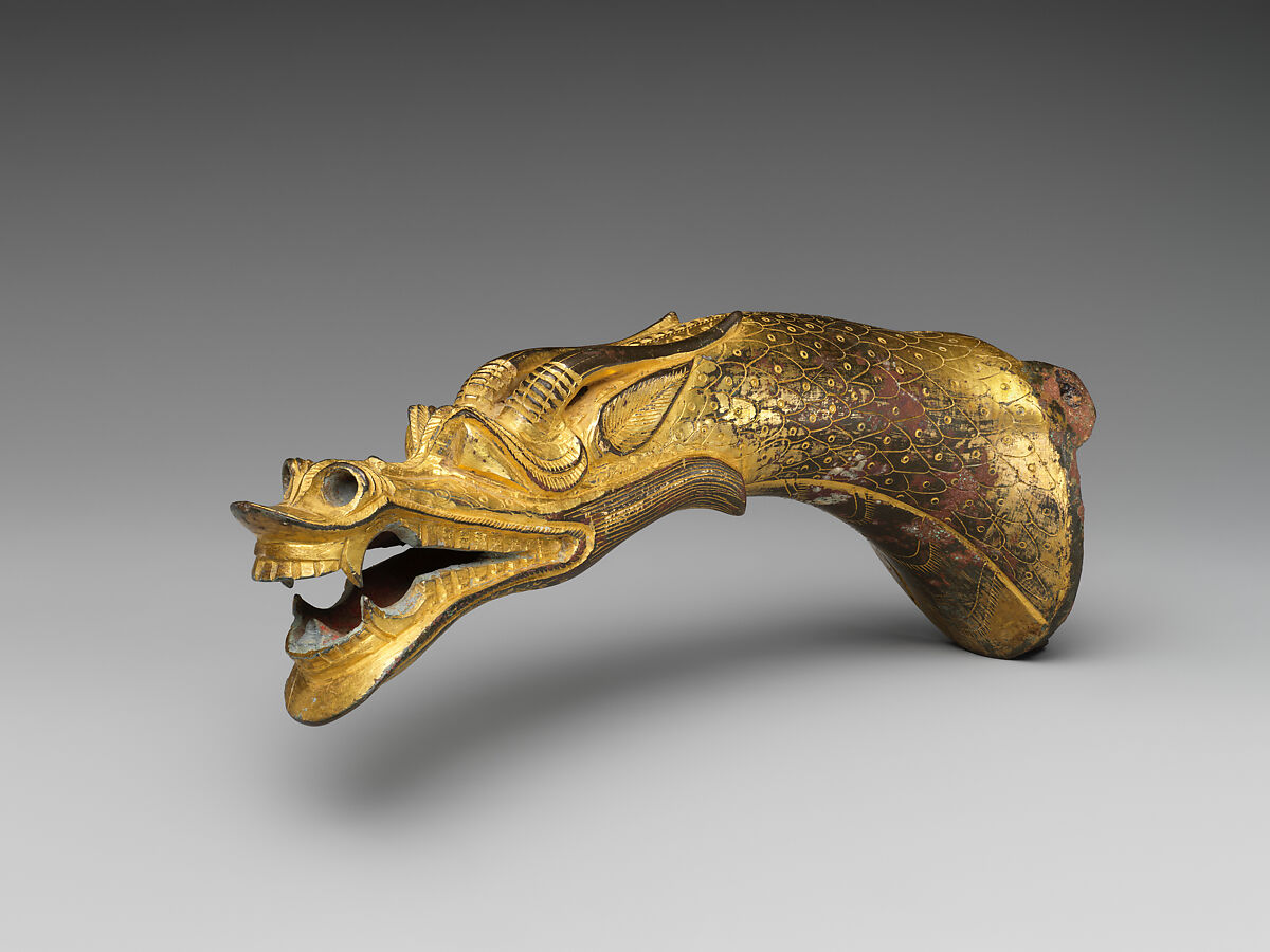 Finial in the shape of a dragon head, Gilt bronze with traces of red pigment, China 