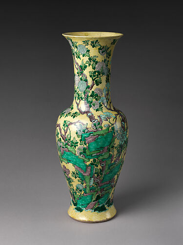 Vase with Rocks and Flowers