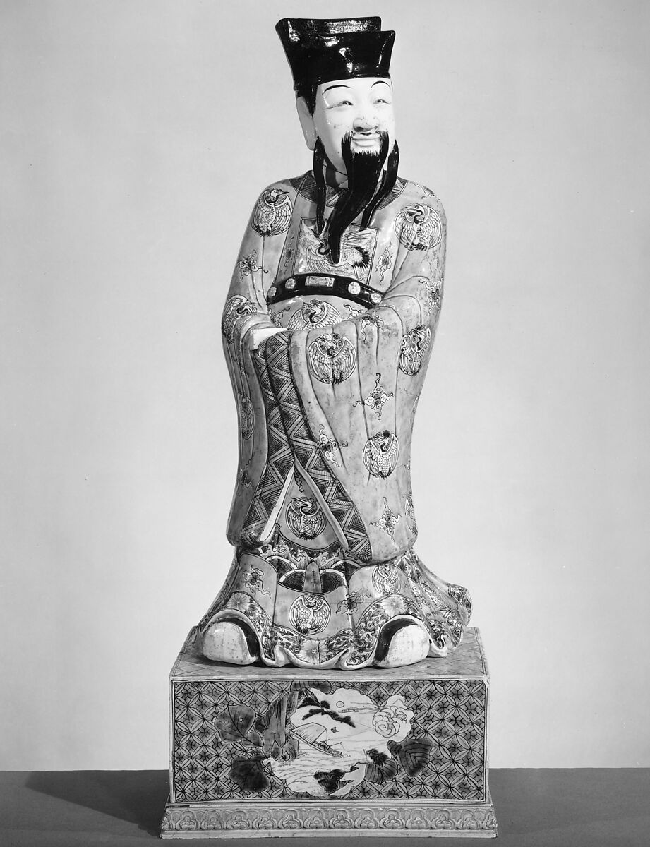Standing Taoist God, Porcelain with five-color biscuit on green ground, China 