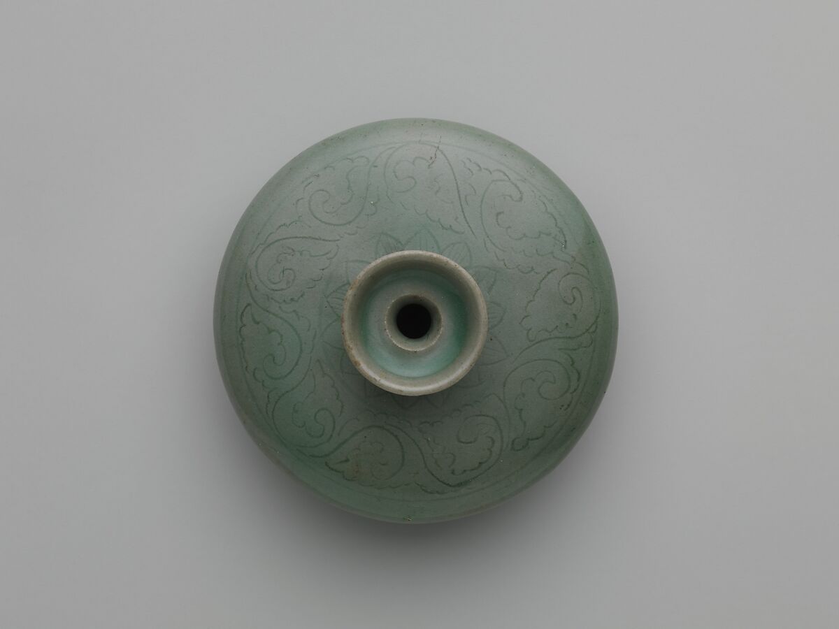 Oil bottle decorated with floral scrolls and lotus petals, Stoneware with incised design under celadon glaze, Korea