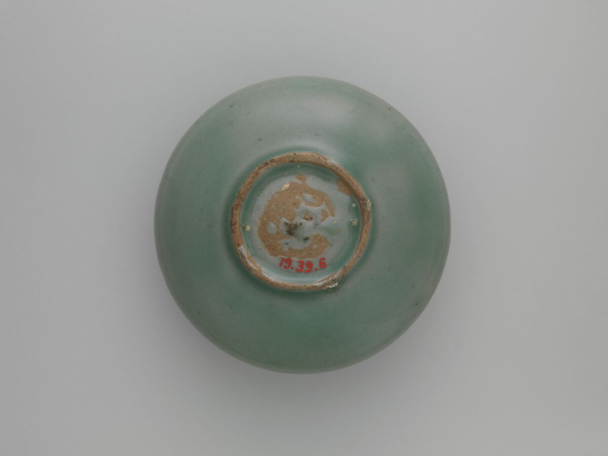 Oil bottle decorated with floral scrolls and lotus petals, Stoneware with incised design under celadon glaze, Korea
