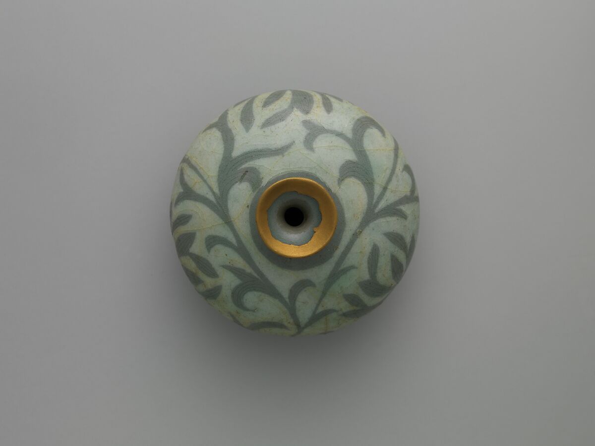 Oil bottle decorated with peony leaves, Stoneware with reverse-inlaid design under celadon glaze, Korea