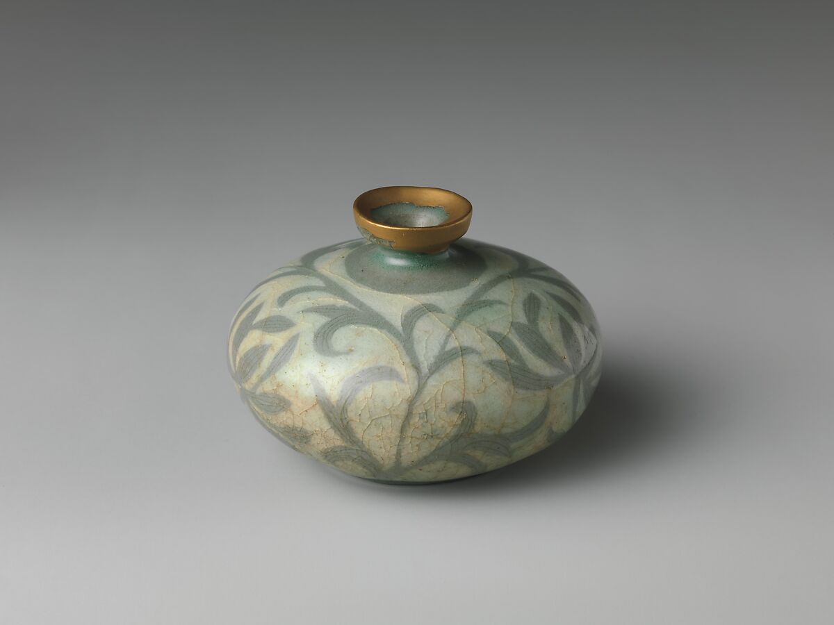 Oil bottle decorated with peony leaves, Stoneware with reverse-inlaid design under celadon glaze, Korea 