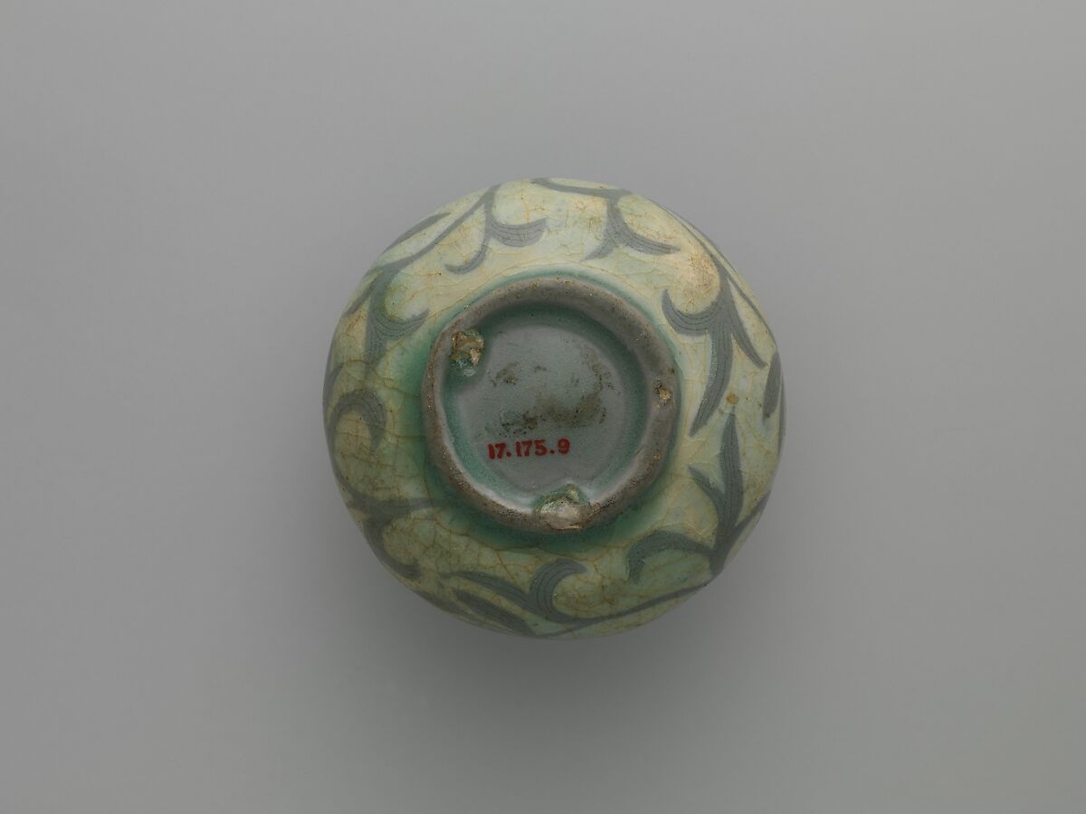 Oil bottle decorated with peony leaves, Stoneware with reverse-inlaid design under celadon glaze, Korea