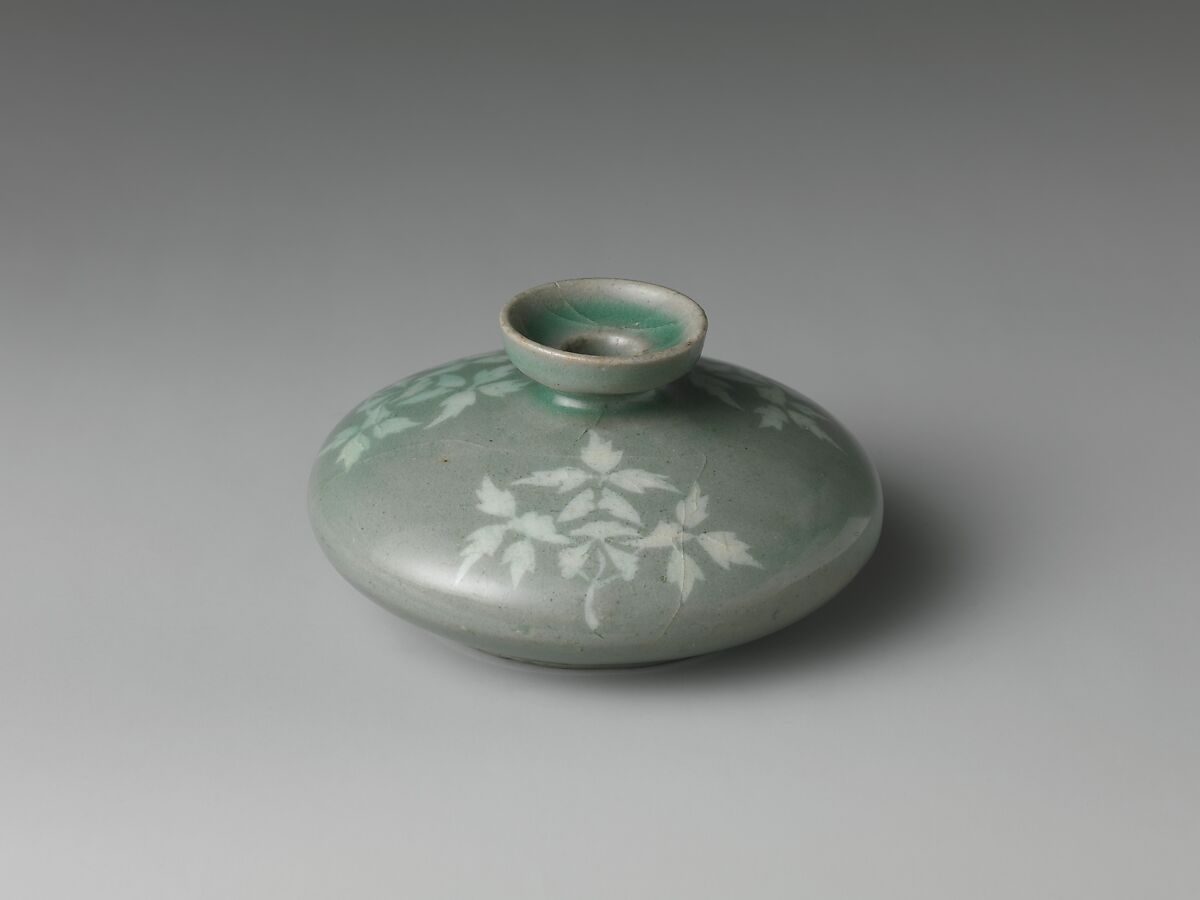 Oil bottle decorated with peony leaves, Stoneware with inlaid design under celadon glaze, Korea 