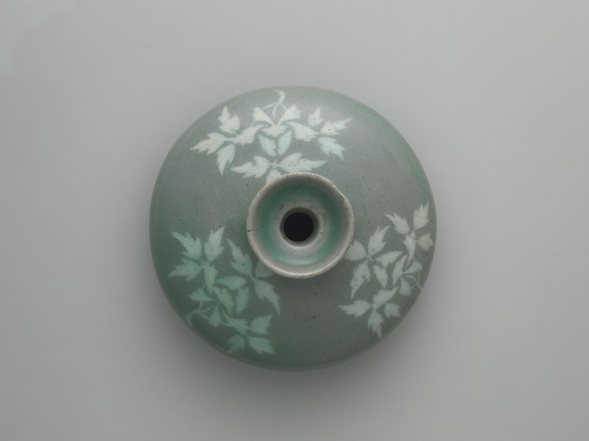 Oil bottle decorated with peony leaves, Stoneware with inlaid design under celadon glaze, Korea