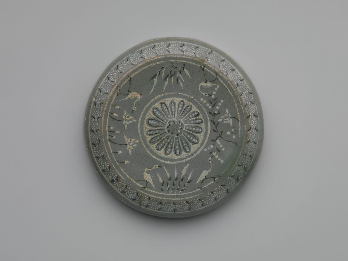 Covered box decorated with chrysanthemums and waterfowl among lotus, Stoneware with inlaid design under celadon glaze, Korea