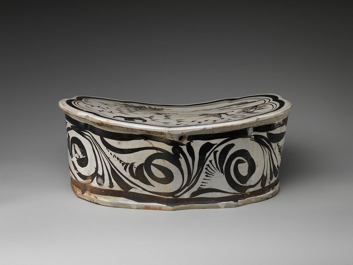 Pillow with a falcon attacking a swan, Stoneware painted with brown and black pigment on white slip under transparent glaze (Cizhou ware), China