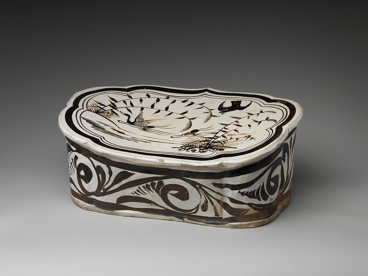 Pillow with a falcon attacking a swan, Stoneware painted with brown and black pigment on white slip under transparent glaze (Cizhou ware), China