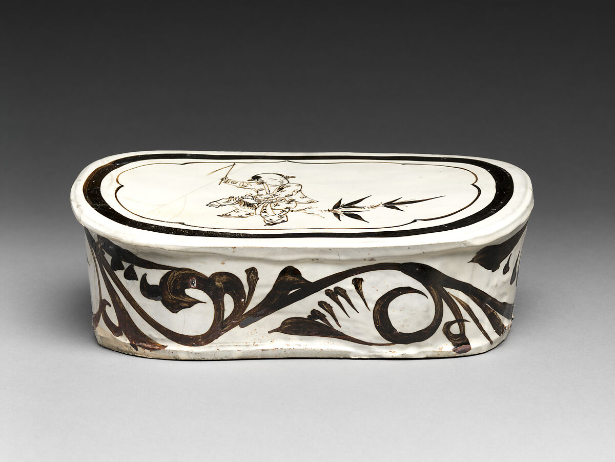 Pillow with boy on hobbyhorse, Zhang family workshop, Stoneware painted with brown and black pigment over white slip under clear glaze (Cizhou ware), China