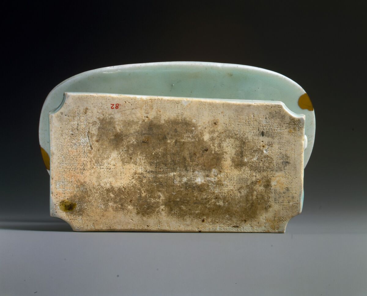 Pillow in Shape of Reclining Woman, Porcelain with incised and carved decoration under celadon glaze (Jingdezhen Qingbai ware), China