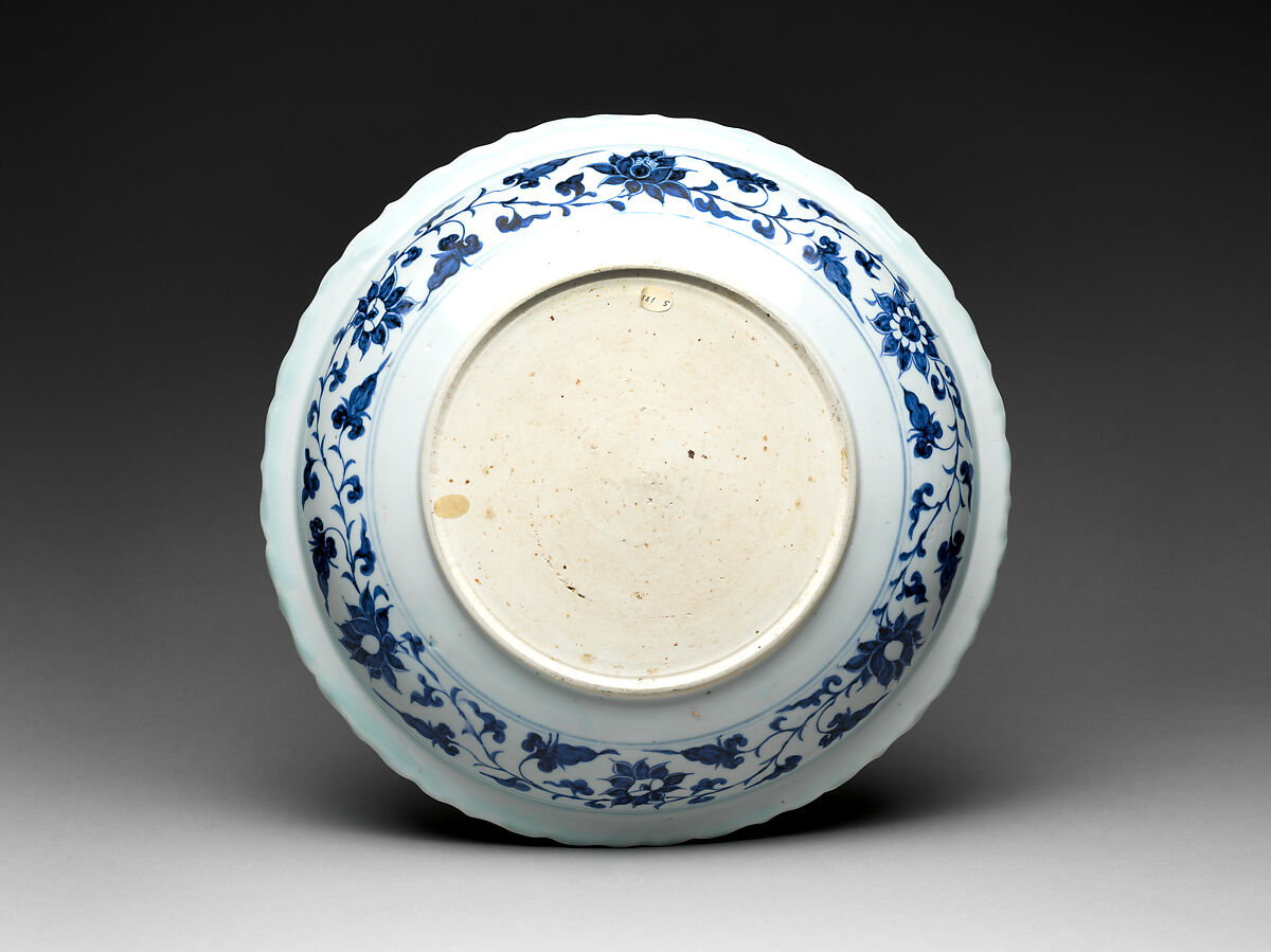 Foliated plate with rocks, plants, and melons, Porcelain painted in underglaze cobalt blue (Jingdezhen ware), China