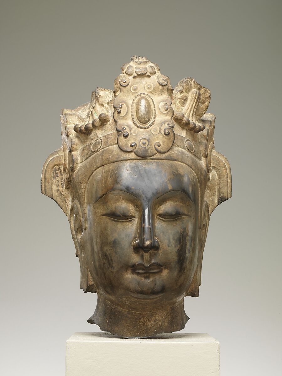 Head of an attendant bodhisattva, Limestone with pigment, China