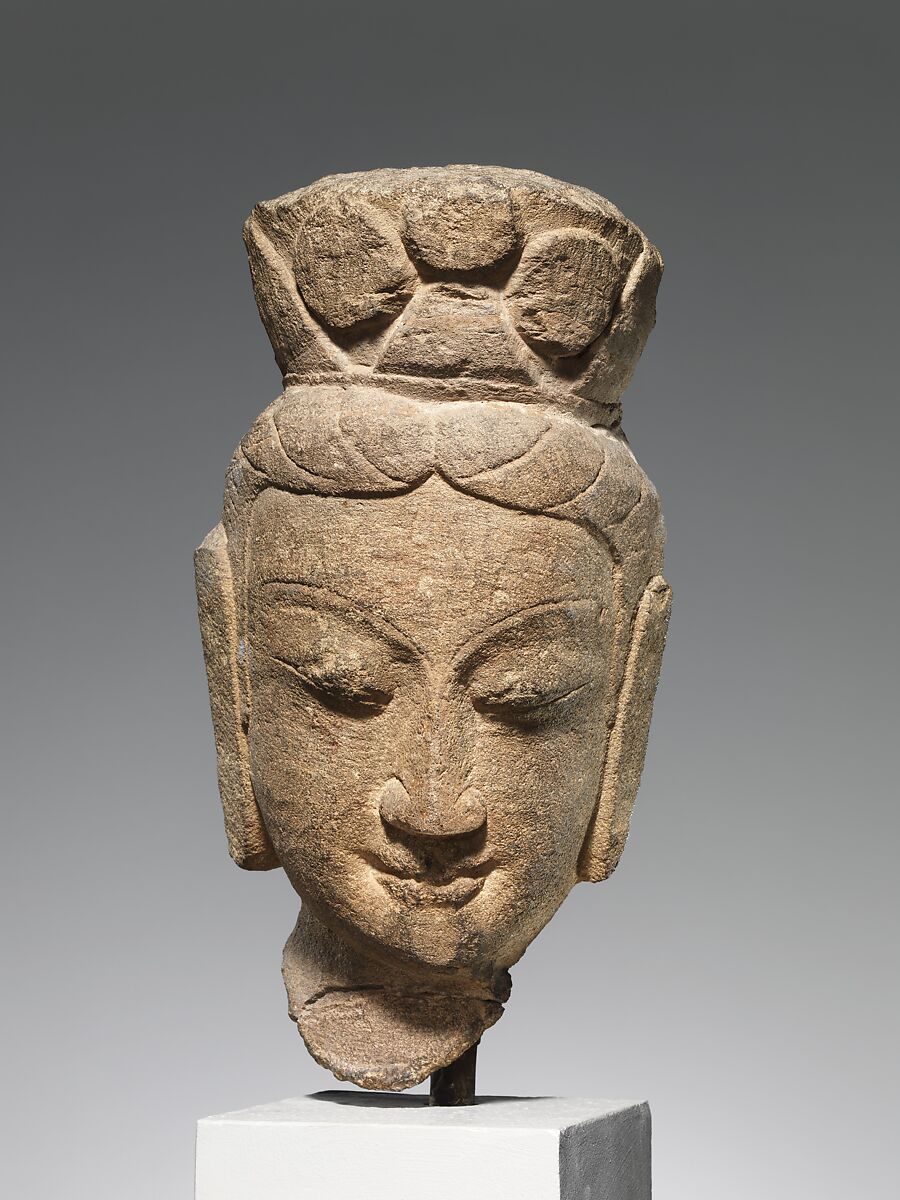 Head of a bodhisattva, Sandstone with traces of pigment, China 