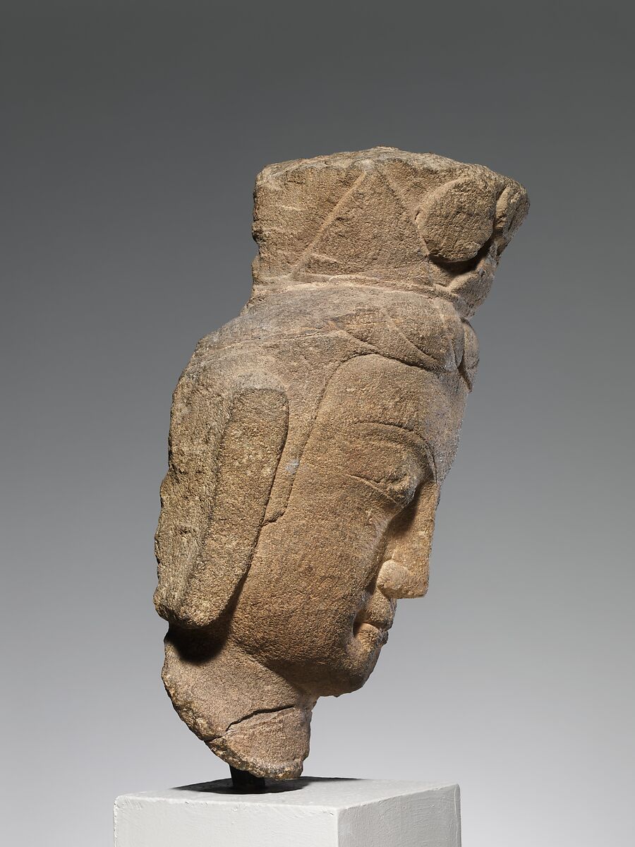 Head of a bodhisattva, Sandstone with traces of pigment, China