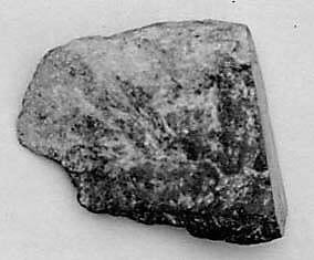 Fragment, Jadeite with inclusions of chromite, Myanmar (Burma) 