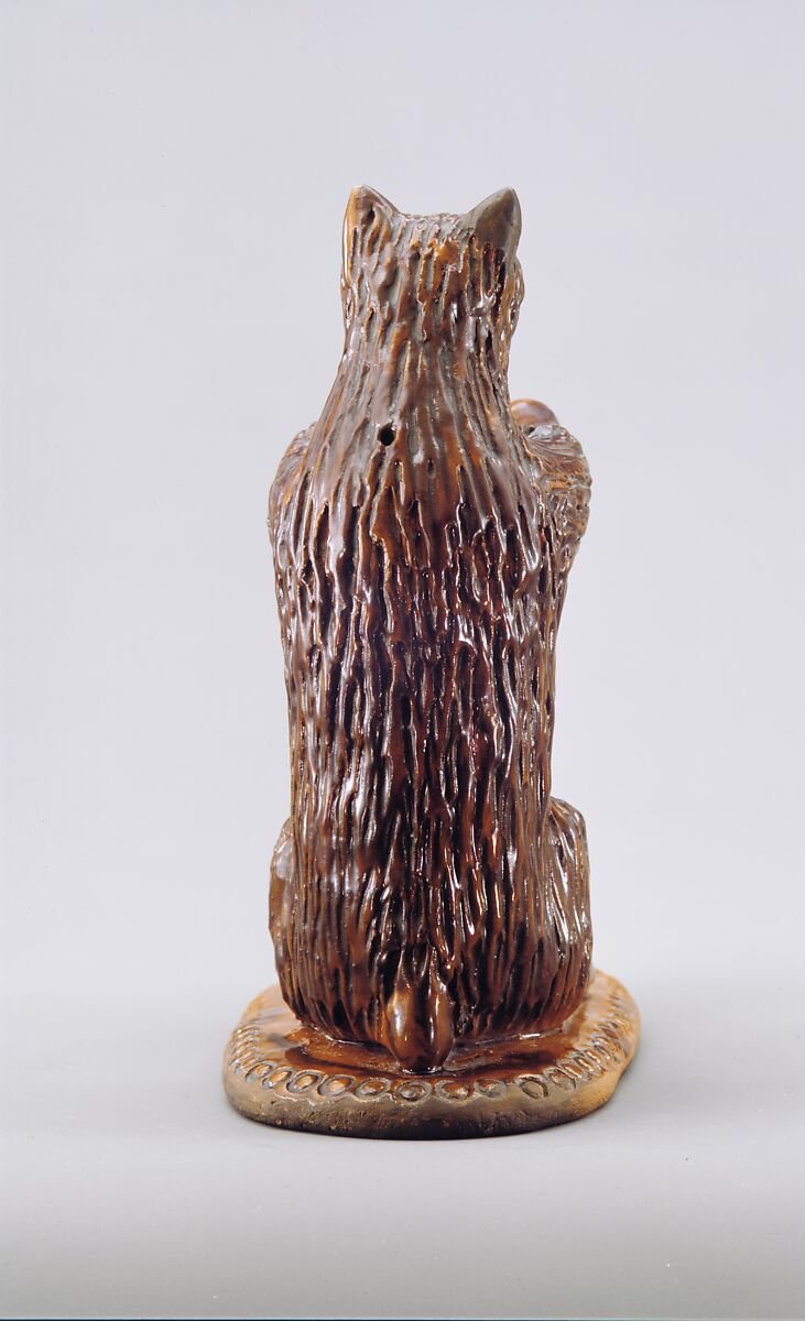 Bear figure and spill holder, Possibly Parker Pottery, Earthenware; Redware with slip decoration, American