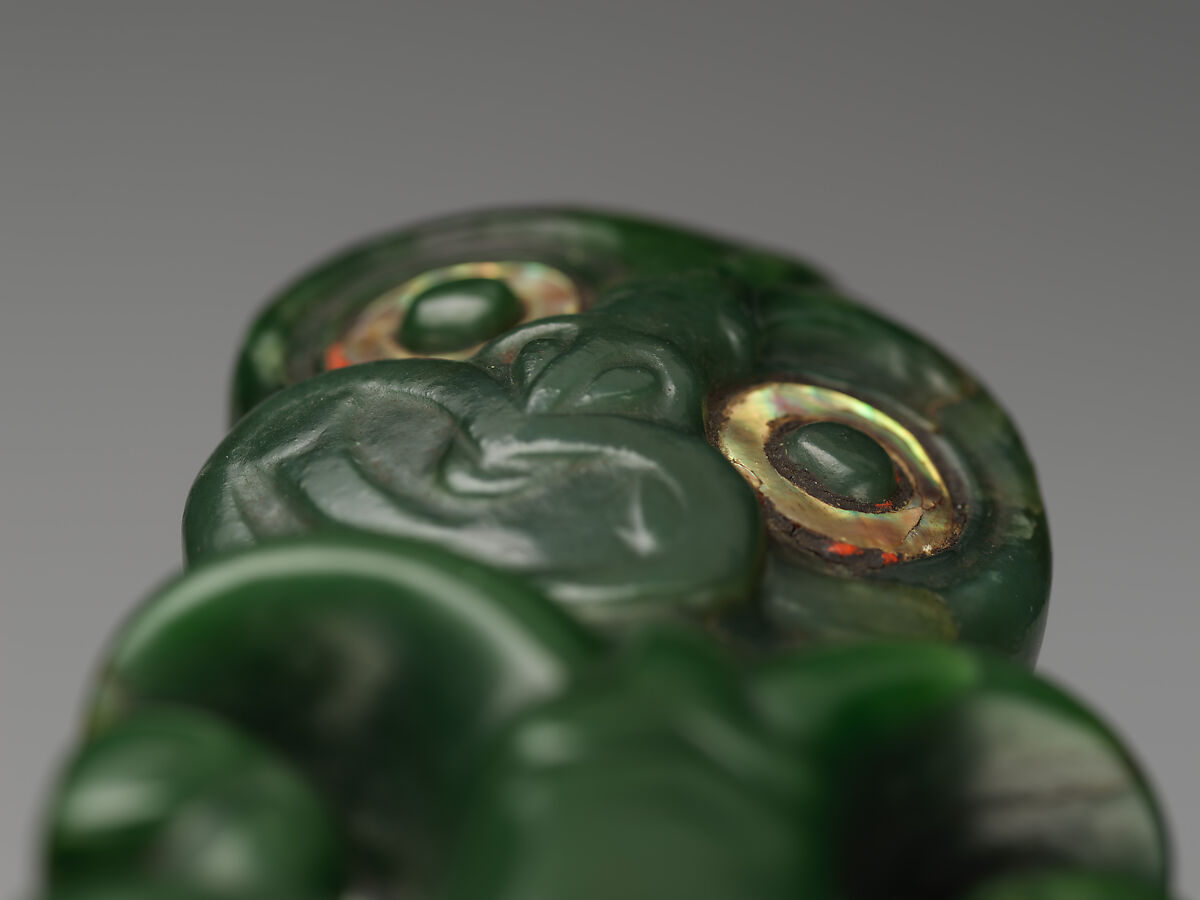 Greenstone pendant, Nephrite jade (pounamu), shell, pigment, and wax, Maori; Aotearoa New Zealand