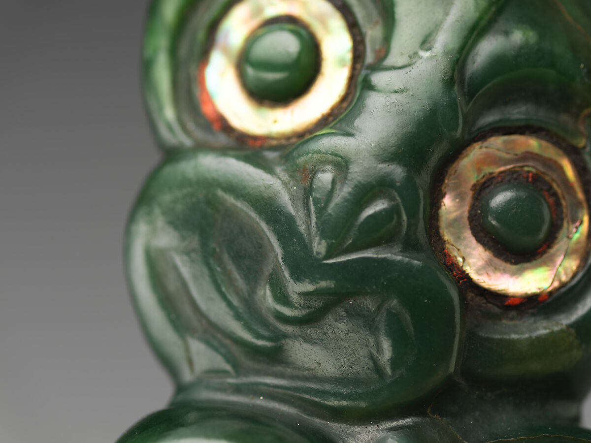 Greenstone pendant, Nephrite jade (pounamu), shell, pigment, and wax, Maori; Aotearoa New Zealand