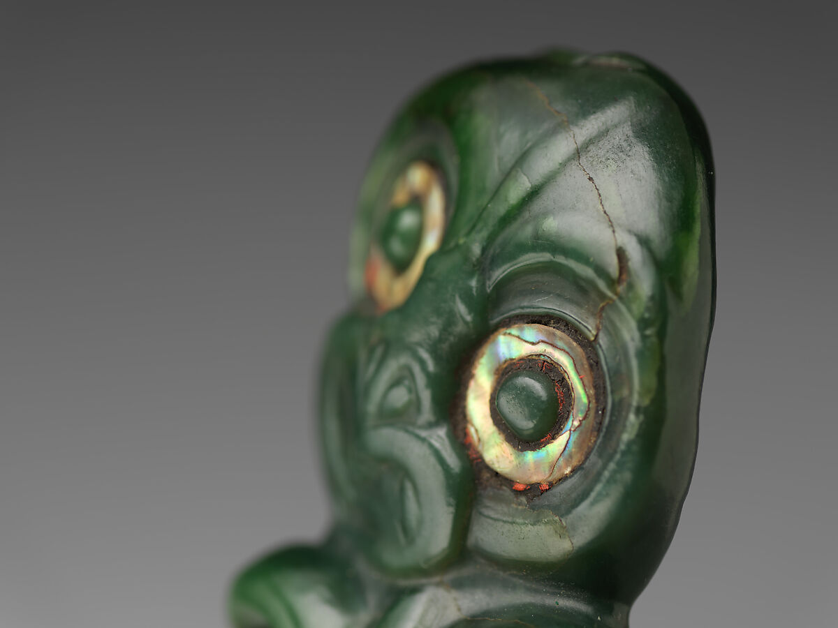 Greenstone pendant, Nephrite jade (pounamu), shell, pigment, and wax, Maori; Aotearoa New Zealand