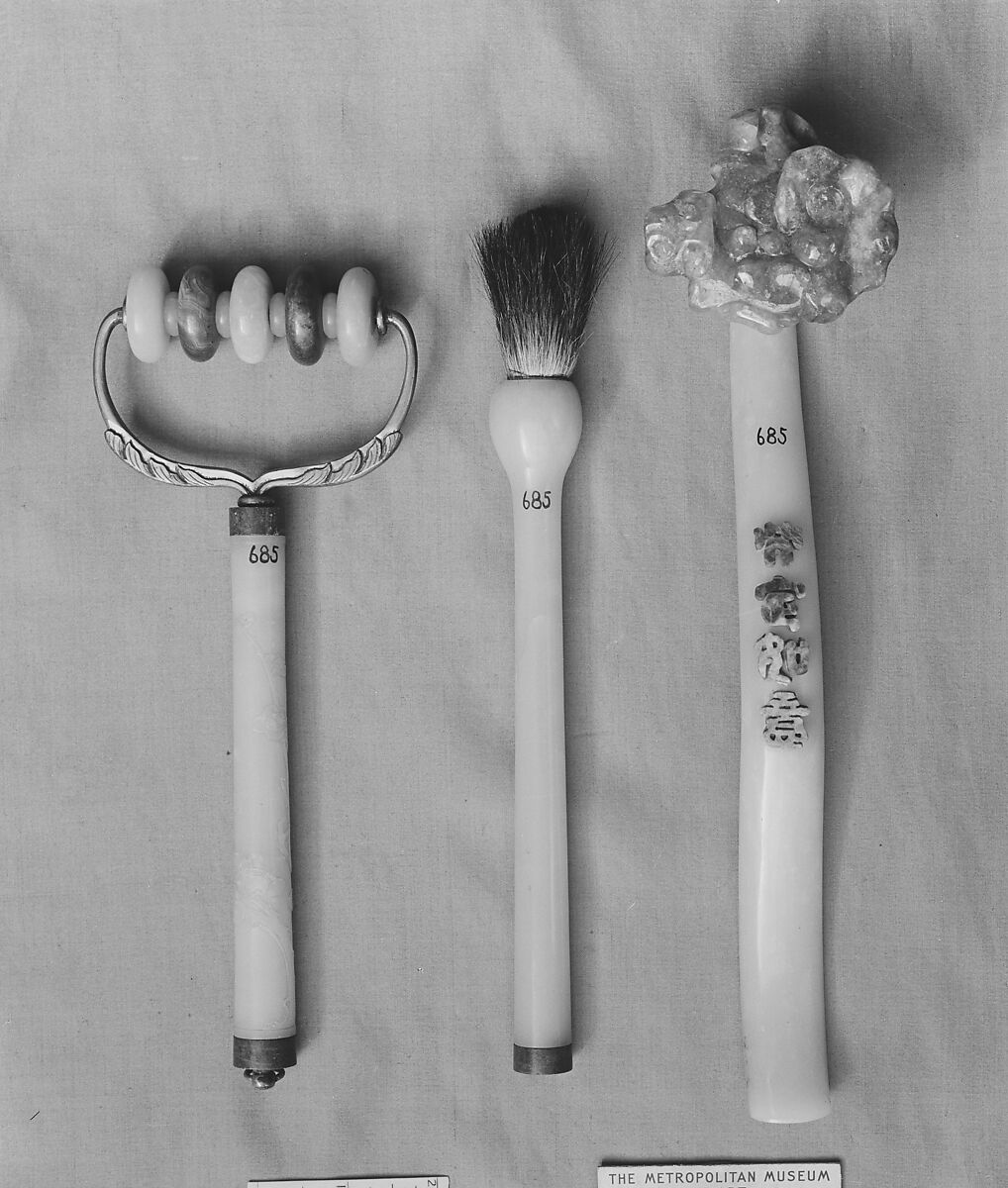 Ruyi scepter, Nephrite, white jade with fungus head of rust-colored tourmaline-rubellite from the Shan Mountain--a much-prized stone called by Chinese "ox-eye", China