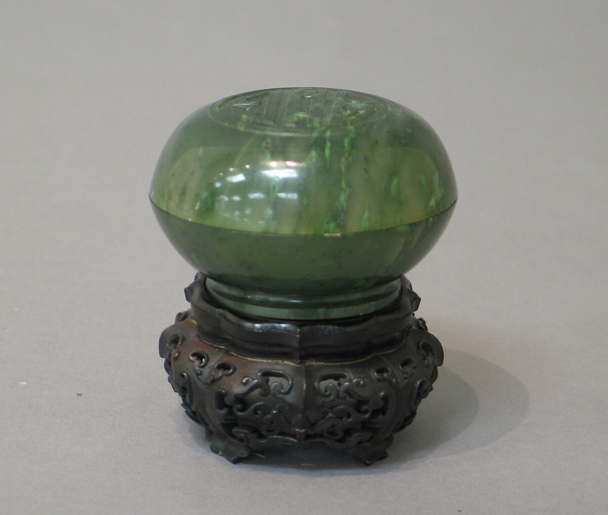 Box with cover, Nephrite, dark olive-green, translucent, and mottled by lighter shades, China 