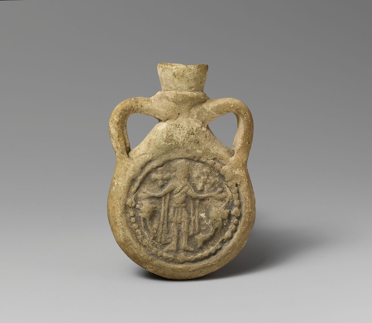 Pilgrim Flask with Saint Menas, Earthenware; unglazed 