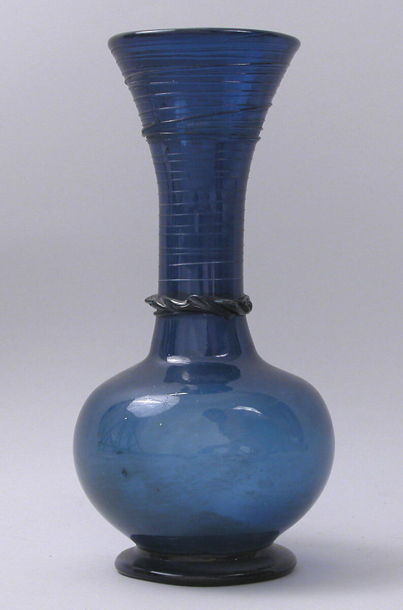 Bottle with a Globular Body, Glass, blue; free blown, folded foot, applied decoration