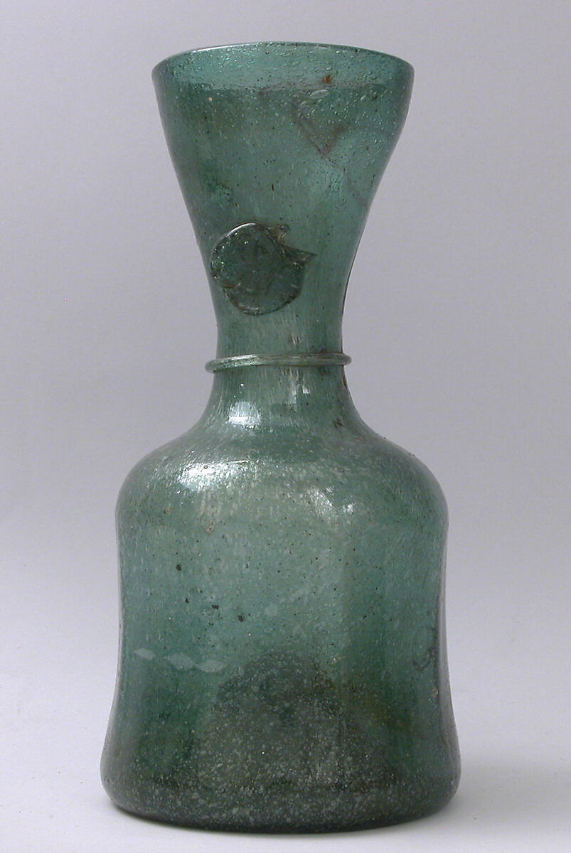 Bottle, Glass; mold blown with applied decoration; tooled on the pontil 