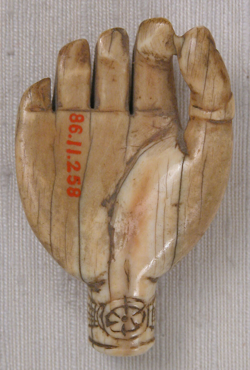 Carving, Ivory; incised and painted